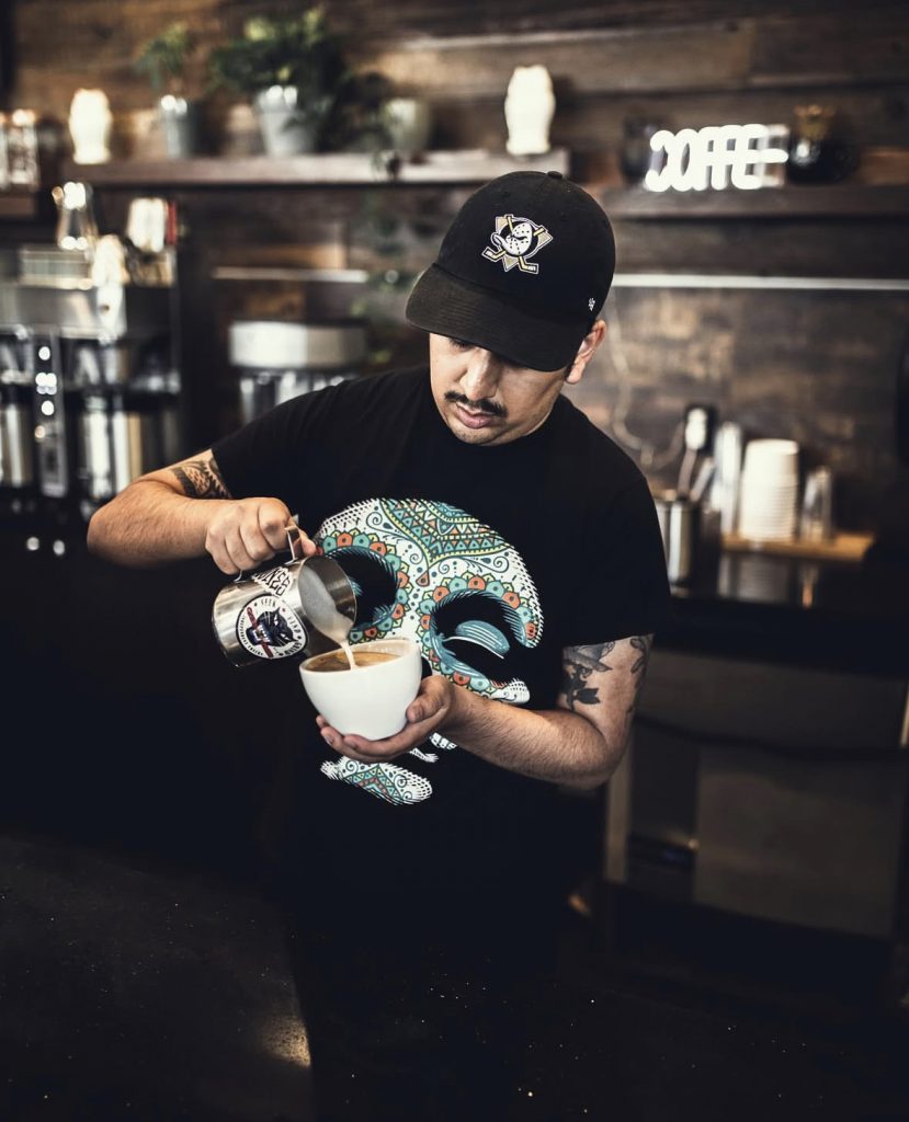 employee making coffee