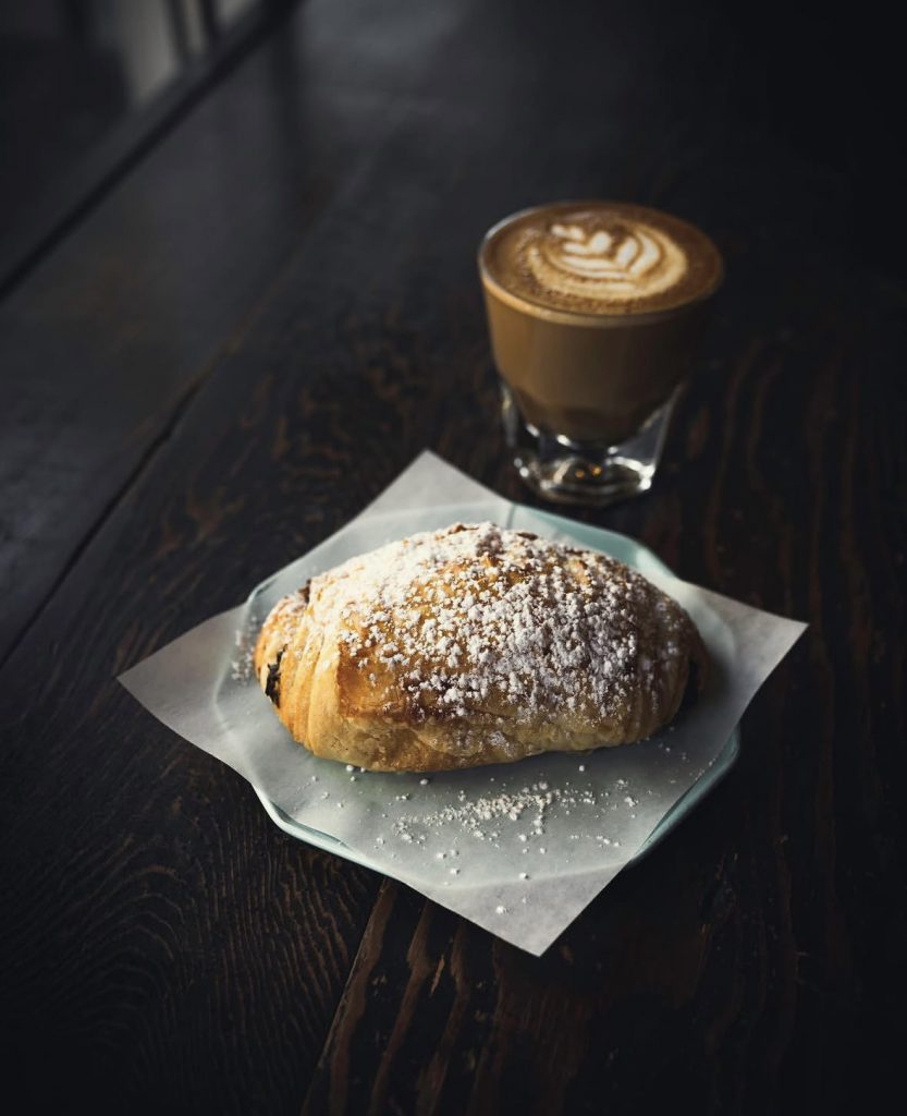 small cup of coffee and pastry