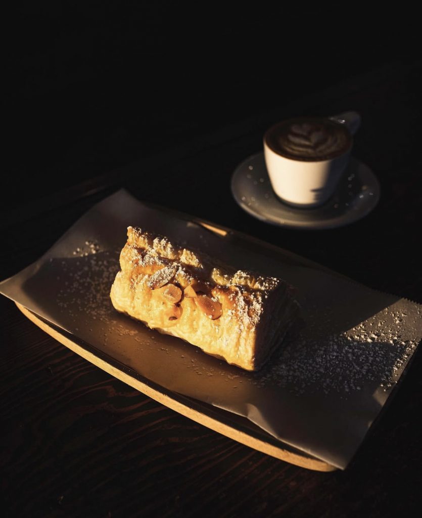 small cup of coffee and pastry